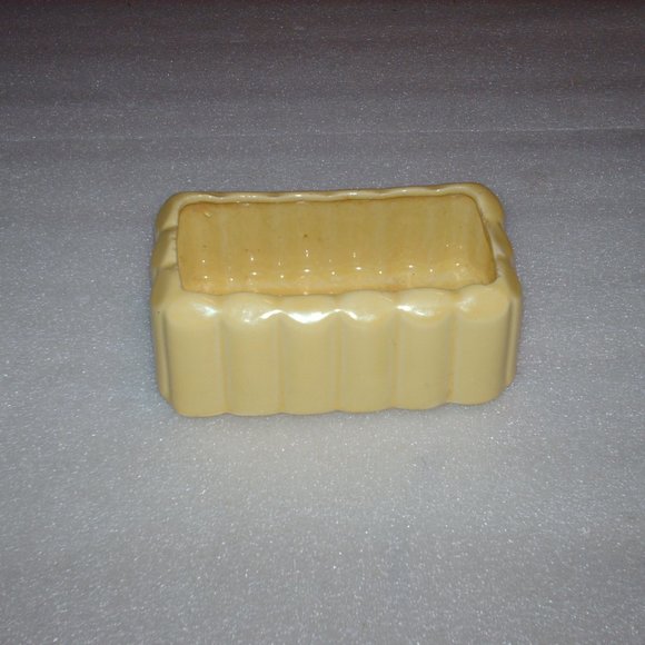 Vintage yellow McCoy pottery planter